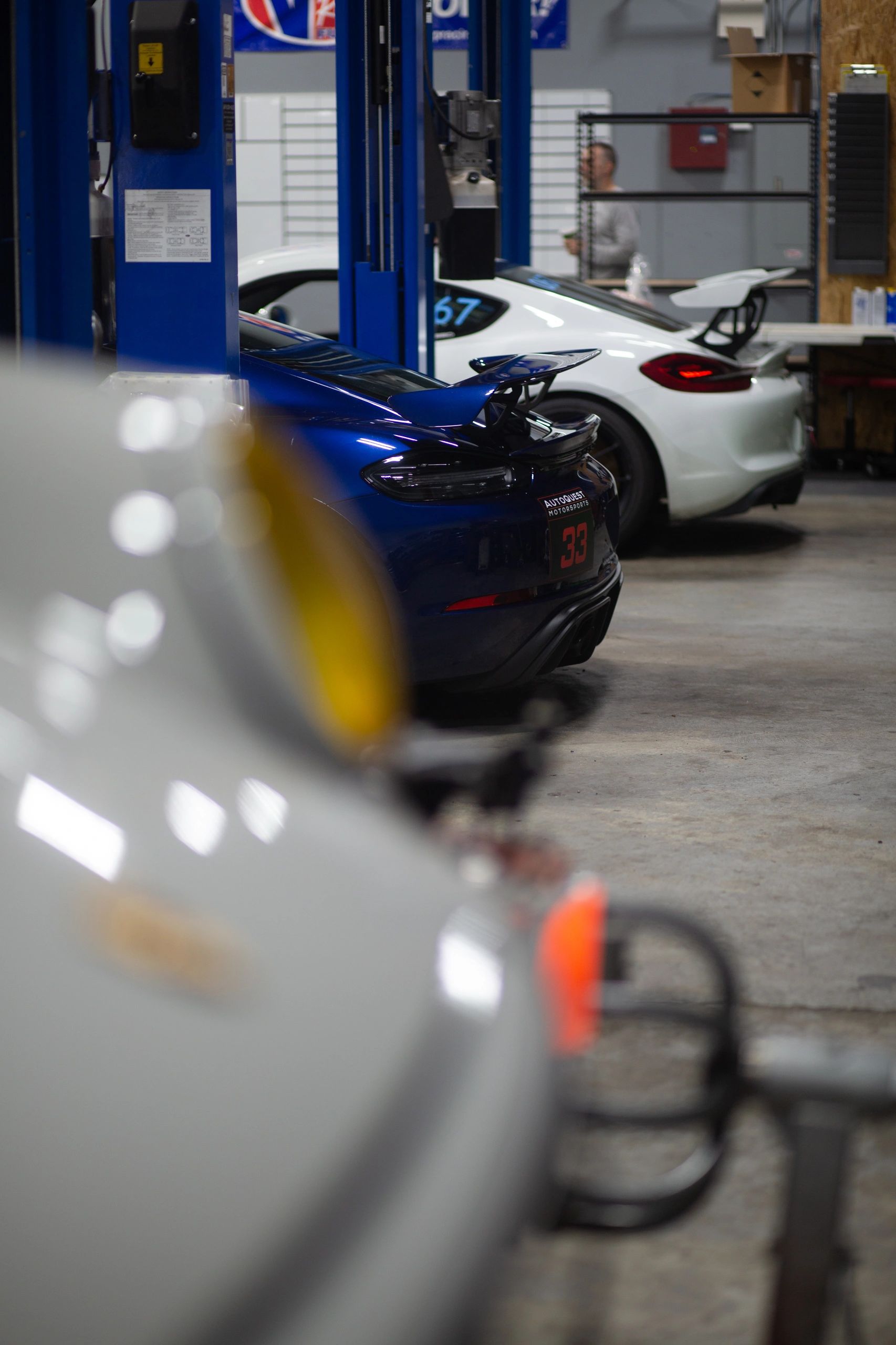 The rear of a race-prepared Porsche in the shop.