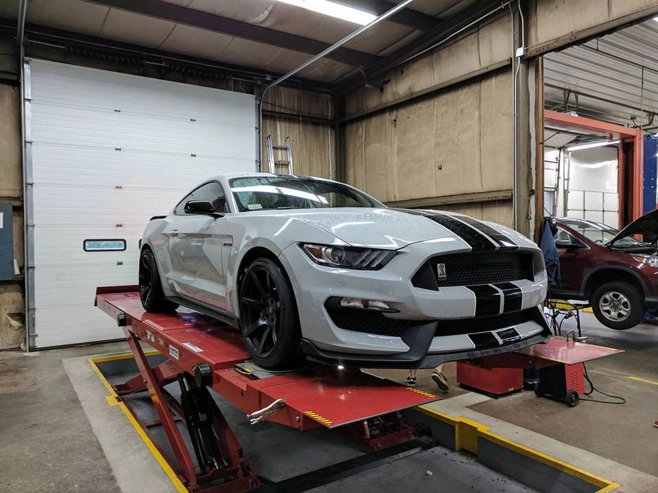 A Mustang on the alignment rack.