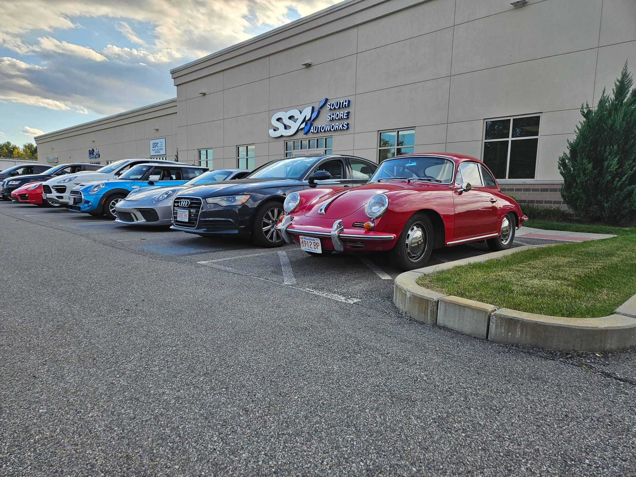 The SSA European Auto Repair shop in Kingston, customer cars parked outside.
